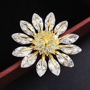 Elegant sunflower brooch featuring yellow central zircon and white marquise petals