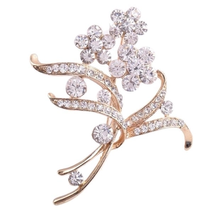 Elegante spilla a fiore dorata con cristalli bianchi per abiti formali e completi