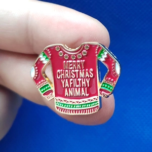 Enamel Christmas ugly sweater brooch with Merry Christmas Ya Filthy Animal quote