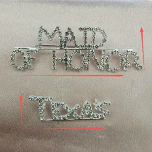 Detail view of rhinestone Maid of Honor brooch with measurements on purple satin