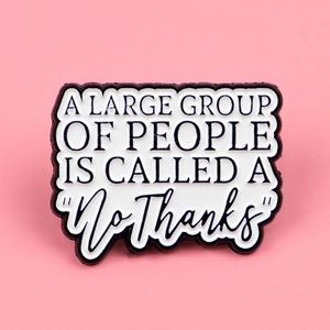 Detail of white enamel pin with humorous quote A Large Group Of People Is Called A No Thanks