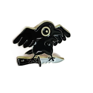 Cartoon black crow on a knife enamel pin badge for Halloween dark fashion accessories
