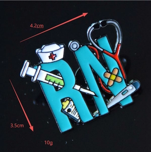 Detail view of RN medical enamel pin showing exact dimensions 4.2cm x 3.5cm and 10g weight