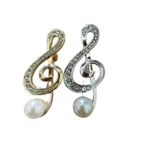 Elegant musical note brooches in gold and silver finish with sparkling rhinestones and pearls