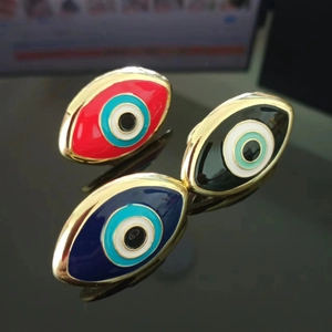 Adjustable gold open rings with blue evil eye enamel design in red, blue, and black