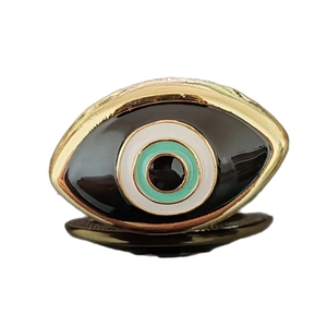 Adjustable evil eye open ring in gold with blue enamel and sparkling crystal detail
