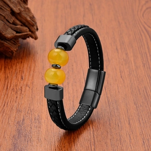 Men's black braided leather bracelet with yellow stone beads and magnetic metal clasp