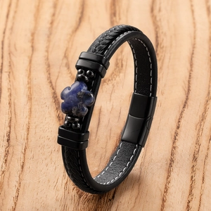 Detail of leather braid strap with blue flower stone and magnetic steel clasp
