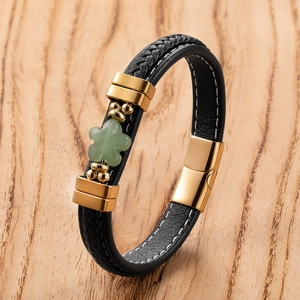 Multi-layer black leather braided bracelet with gold metal and green clover charm