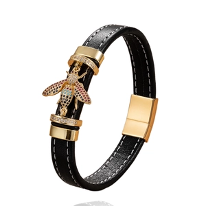 Mens punk woven black leather bracelet with crystal gold bee accent and white stitching