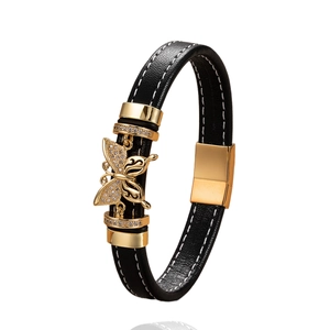 Bracciale moda in pelle con ciondolo a fiocco, chiusura magnetica dorata e cuciture bianche