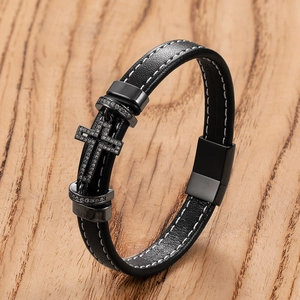Men's black braided leather bracelet with cross charm and magnetic clasp