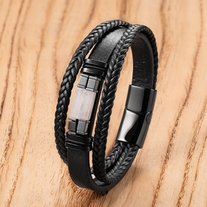 Detail of multi-layer leather bracelet with natural stone and magnetic clasp closure