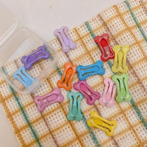 Set di fermagli colorati glitterati a forma di osso per bambini e piccoli cani