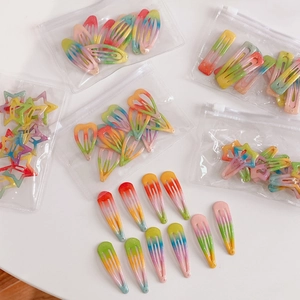 Rainbow gradient glitter hair clips set with star, heart, and drop shapes for girls
