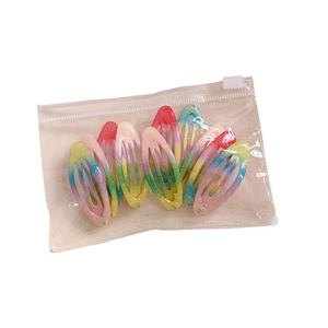 Set of 10 gradient rainbow glitter BB hair clips for girls in a clear zip storage bag