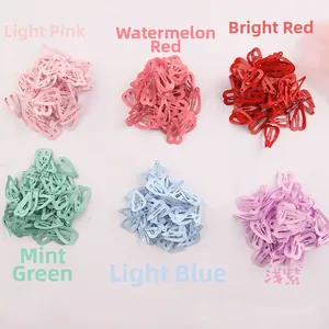 Top view of 2cm heart-shaped colorful painted metal BB clips in six vibrant assorted colors