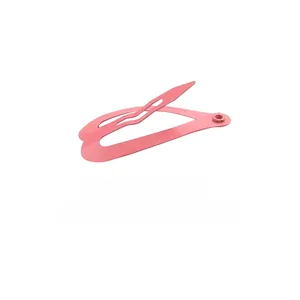 Close-up of a 2cm pink matte metal BB hair clip with smooth painted finish for styling