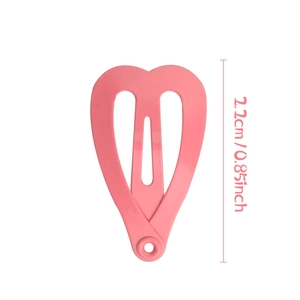 Detail showing a 2.2cm matte pink heart-shaped metal BB hair clip for pets and dolls