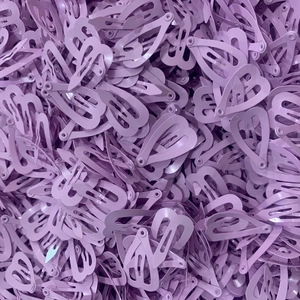 Detailed bulk view of 2cm purple mini heart-shaped metallic snap hair clips with glossy finish