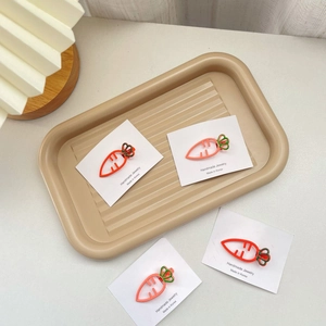 Lot de jolies barrettes carotte en métal creux orange et rose sur carte de support