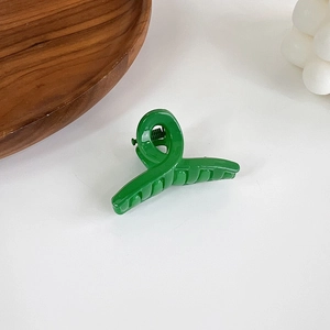 Glossy green minimalist crossover hair claw clip for women stylish daily hair styling