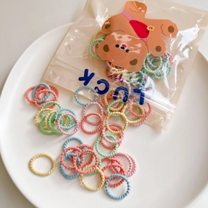 Elastic colorful rainbow hair ties for babies in a cute bear patterned lucky storage bag