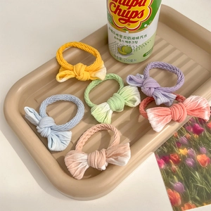 Set of six gradient macaron bow hair ties in pastel colors like mint and pink