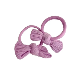 Set of two purple bow hair ties made from soft ribbed fabric for girls hair styling
