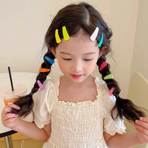 Vibrant candy colored teardrop BB hair clips for girls set on braided hairstyle