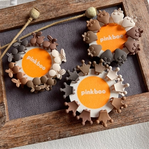 Cute matte floral and crown mini hair claws in Morandi neutral tones on display card