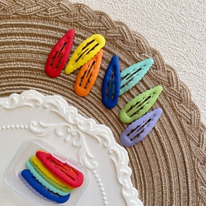 Rainbow matte wavy snap hair clips set for girls in a clear storage box