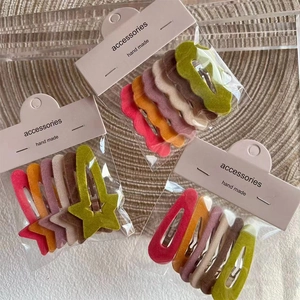 Lot de barrettes à cheveux colorées en velours floqué en formes d'étoile et ovale