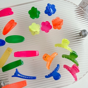 Vibrant jelly color floral and geometric hair clips in a multi-piece colorful set