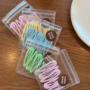 Colorful macaron candy color teardrop metal hair clips in various bright matte finishes