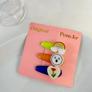 Set of 3 fluorescent cartoon hair clips with rainbow heart and smiley face motifs