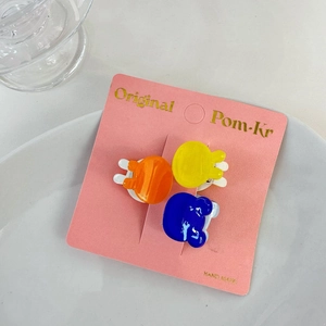 Set of three cute neon cartoon animal hair clips in orange yellow and blue colors