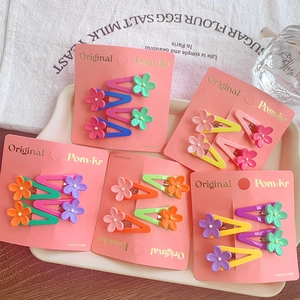 Set of 4 cute candy-colored flower hair clips for girls in various macaron shades