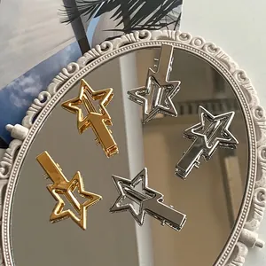 Five-piece vintage star-shaped hollow alloy hair clips in polished gold and silver finishes