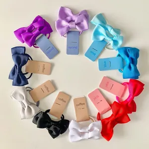 Colorful bow ribbon hair ties set for girls with elastic bands on white background