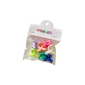 Set of colorful mini matte hair claws for girls in various candy pastel colors