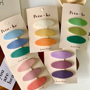 Set of minimalist oval fabric hair clips for girls in gradient pastel color tones