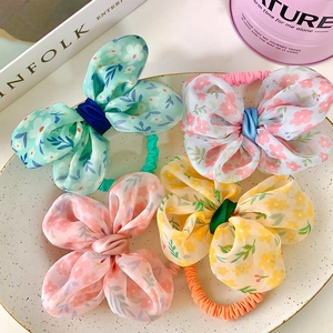 Set di elastici per capelli con fiocco floreale in chiffon in quattro colori pastello