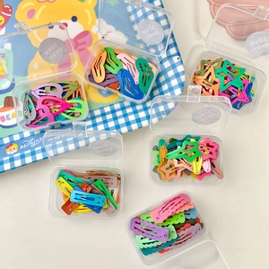 Set of colorful mini metal hair clips for kids in various shapes with storage boxes