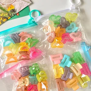 Set of colorful jelly mini hair claws for girls in transparent pom.kr storage bags