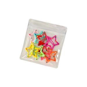 Colorful polka dot star-shaped BB hair clips set in transparent packaging for girls