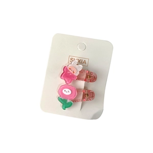 Cute pink glitter rabbit and flower hair clips set for girls on a white display card