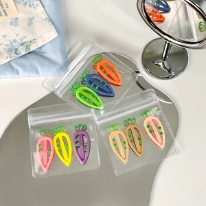 Colorful 9-piece set of cute carrot-shaped hair clips for girls in various matte finishes