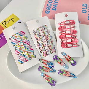 Set of 6 colorful printed snap hair clips for girls with cute geometric patterns