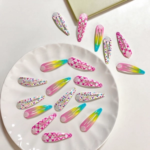 Cute polka dot and checkered print hair clips set in colorful macaron shades for girls